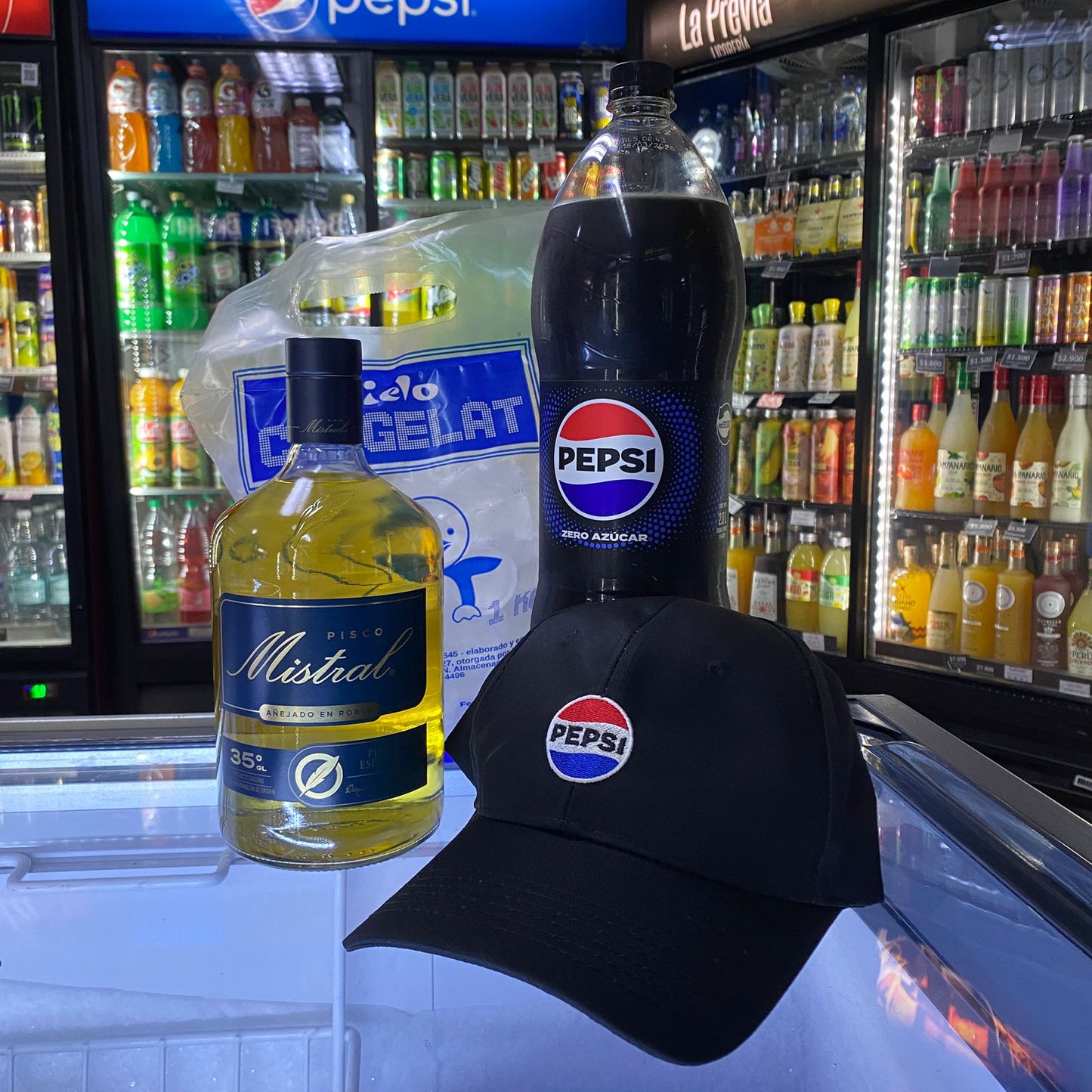 Promo Pisco Mistral 1L + Pepsi Zero 2 lt + Hielo + Gorro